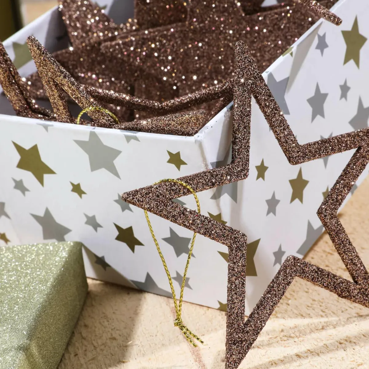 Online DecoWoerner Deko Glitzersterne, Pack á 10 Stück braun