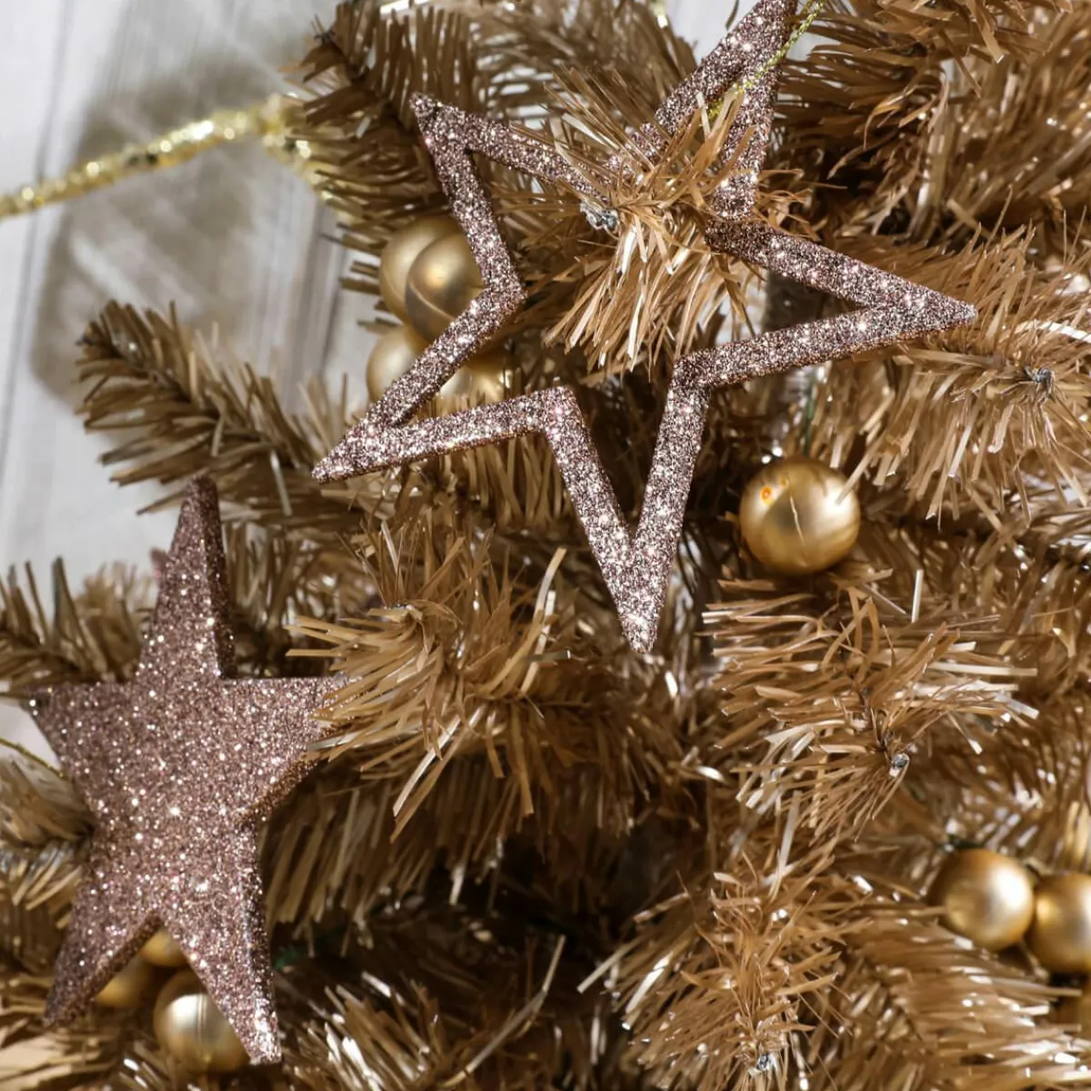Online DecoWoerner Deko Glitzersterne, Pack á 10 Stück braun